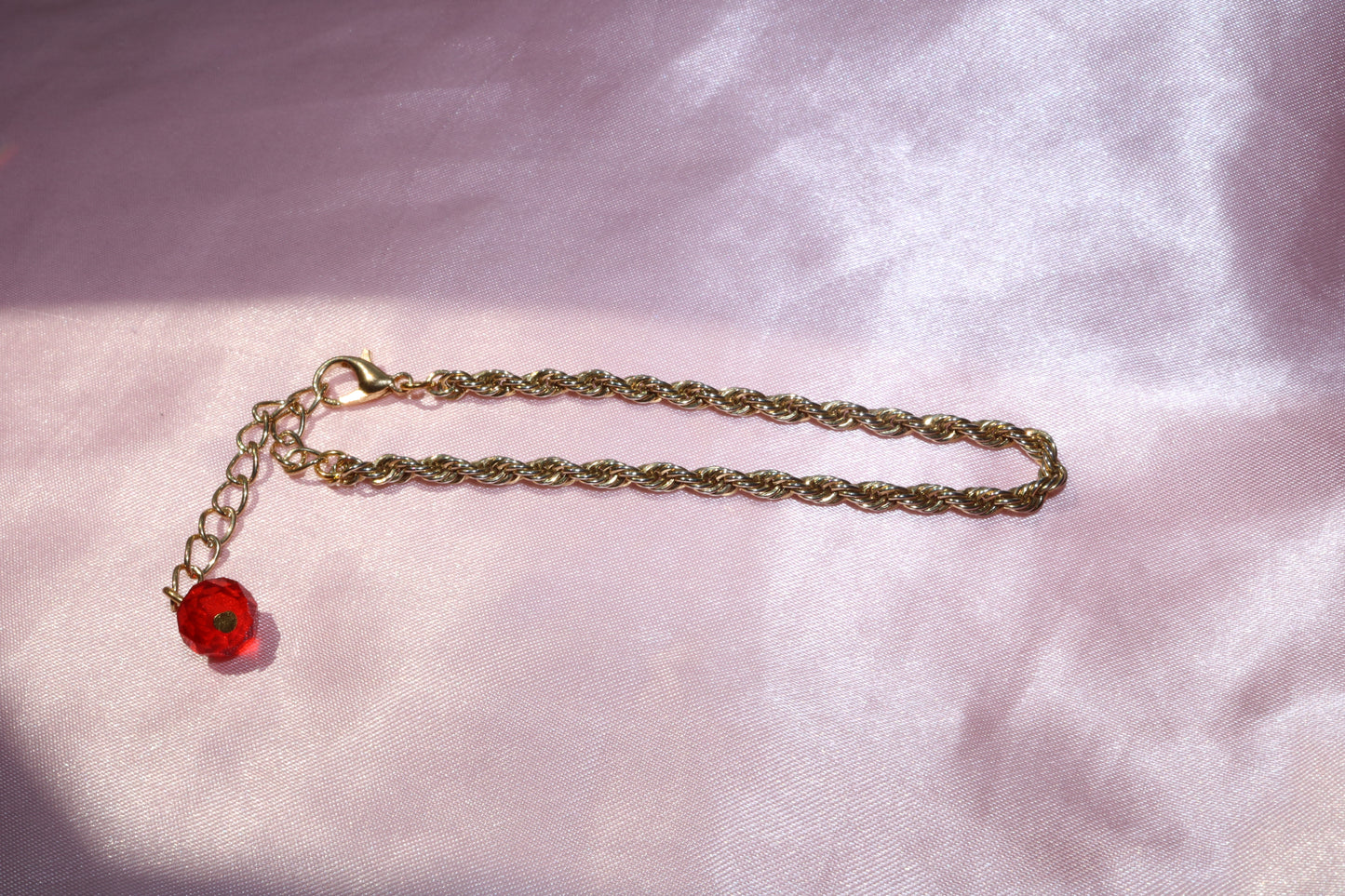 Gold Rope Chain Bracelet with Red Bead Charm