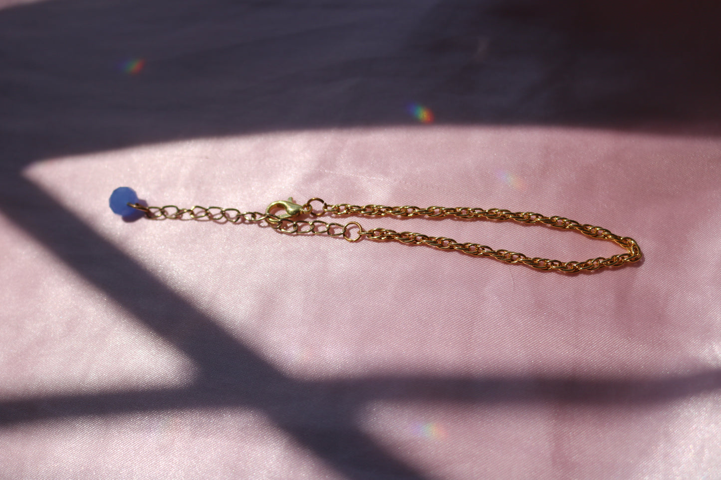 Gold Rope Chain Bracelet with Blue Bead Charm