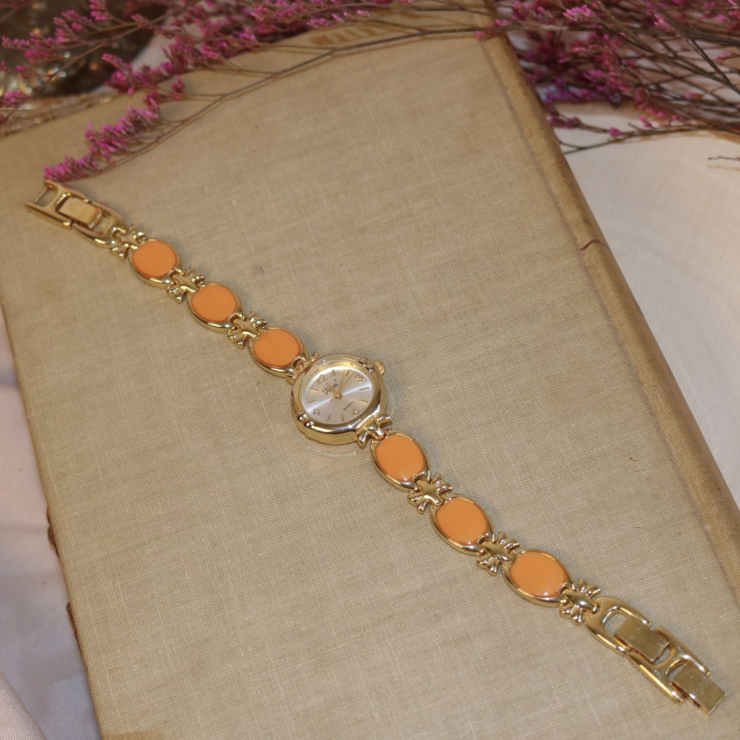 Vimi Gold Tone Orange Enamel Quartz Watch