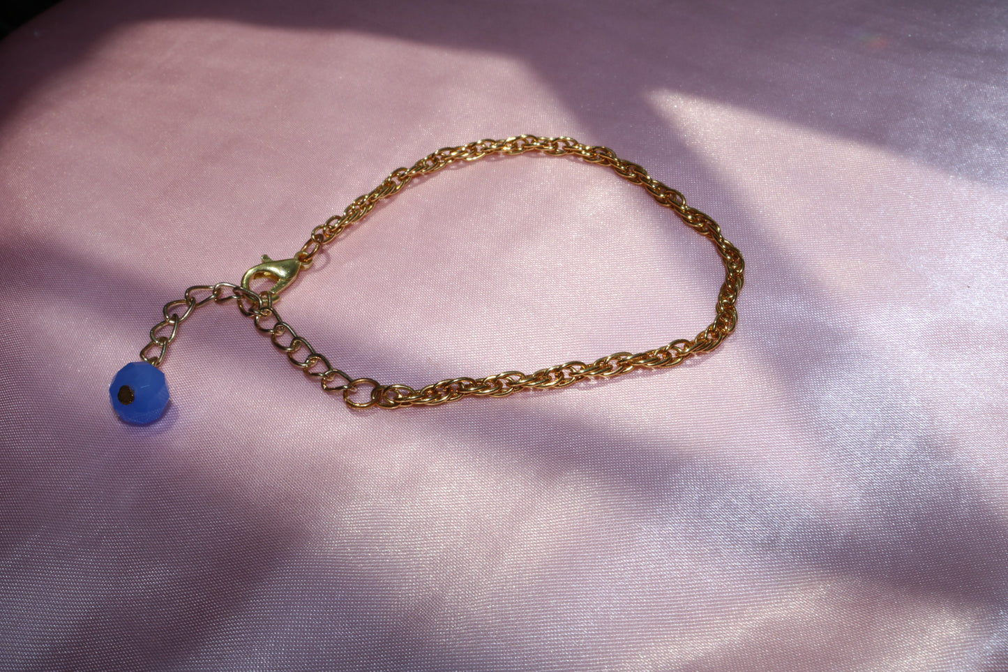 Gold Rope Chain Bracelet with Blue Bead Charm